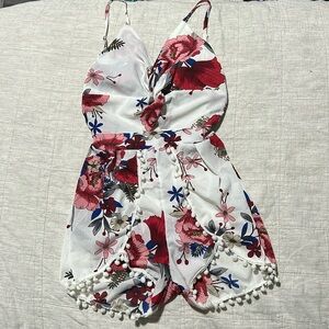 BRAND NEW Open back Romper. Size S